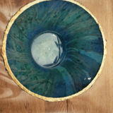 Vase en verre recouvert de soie