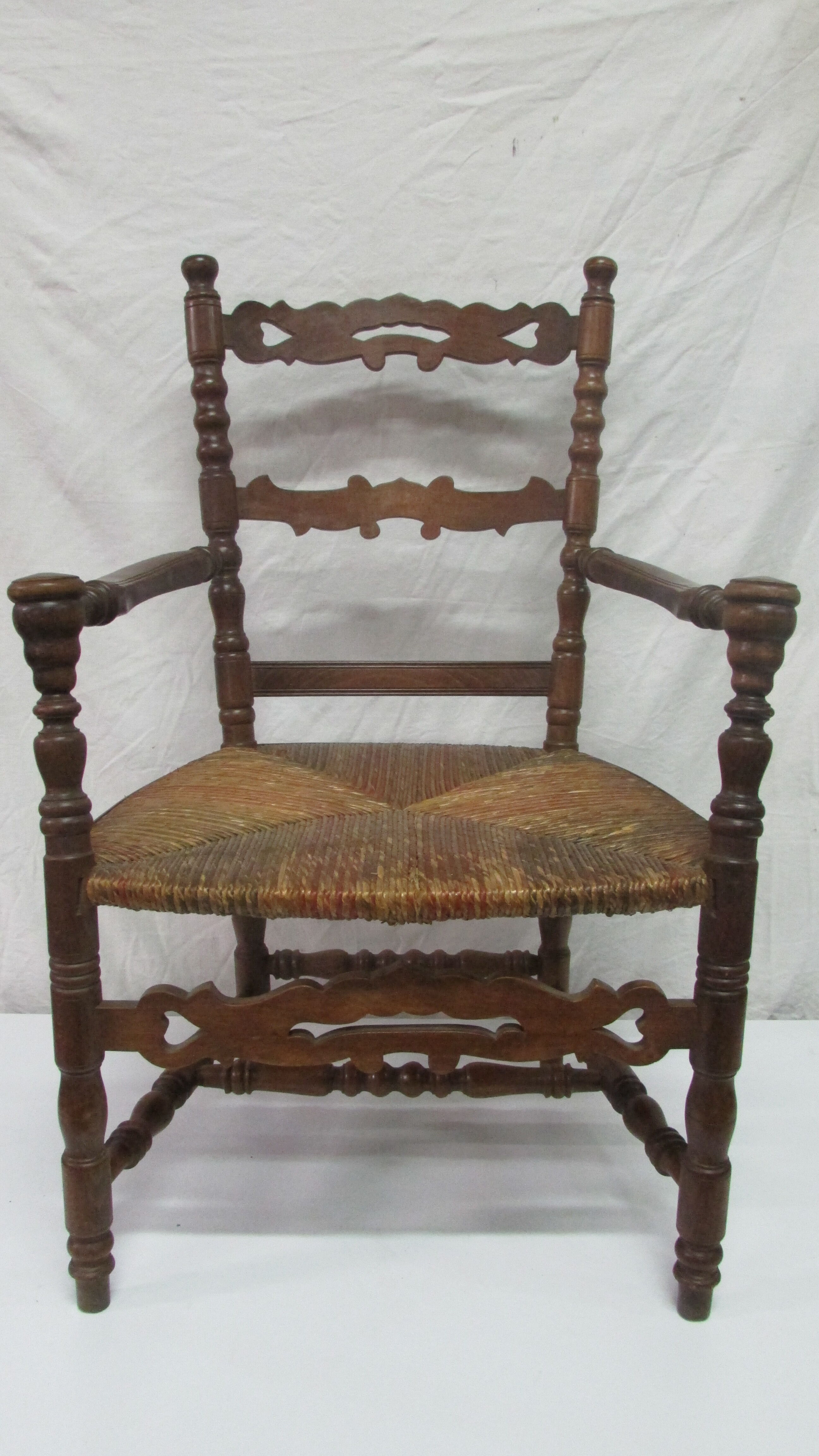 Antique armchair with armrests