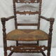 Antique armchair with armrests
