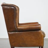Sheep leather wingback chair with patina