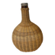 Vintage wicker covered flat bottle