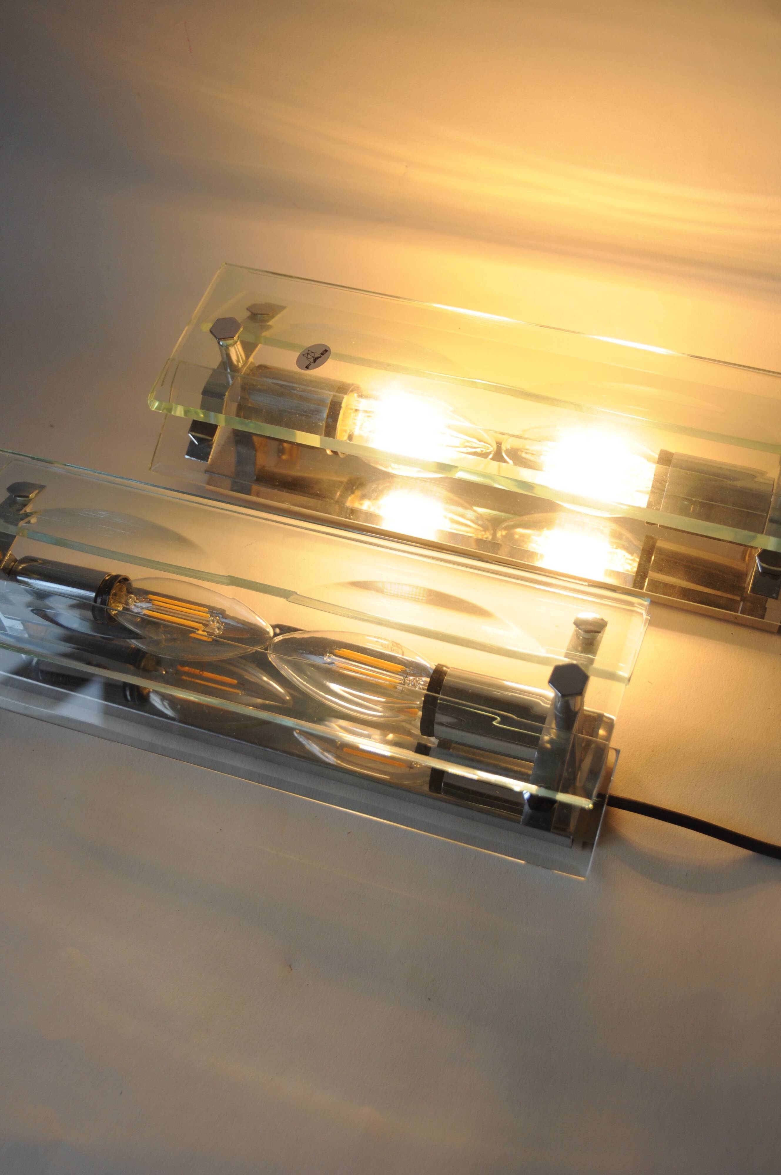 Pair of vintage glass and chrome wall sconces