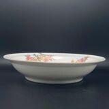 Round hollow Limoges dish with small yellow and purple flower patterns