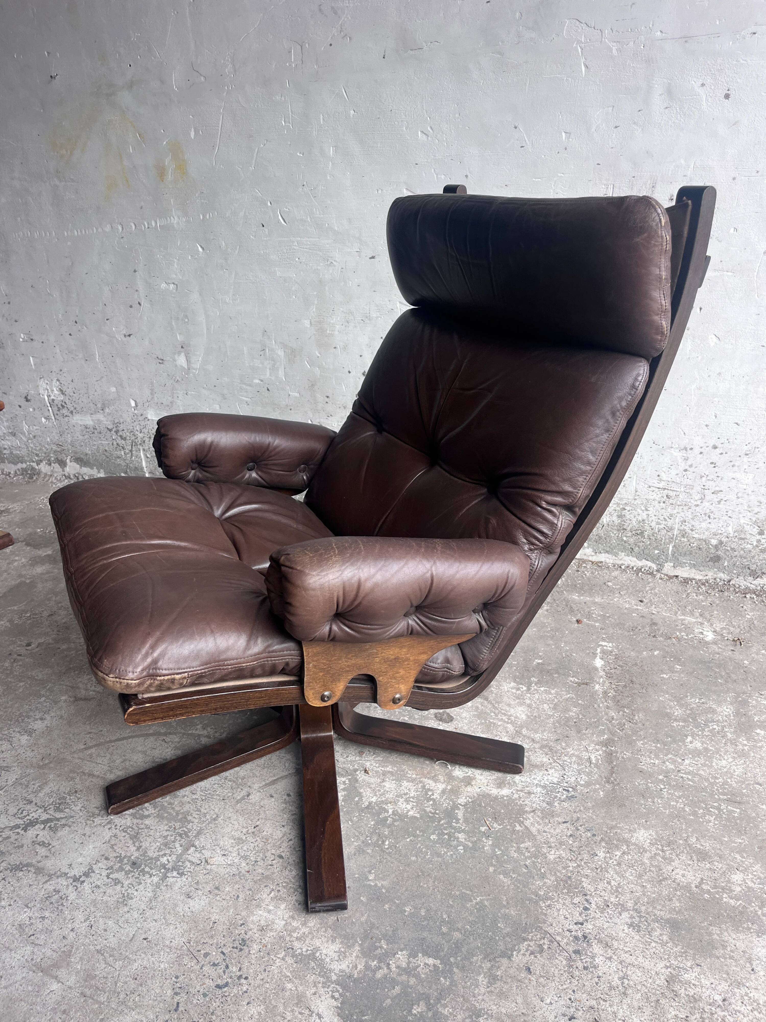 Vintage Scandinavian swivel lounge chair in leather, 1970s