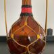 Vintage amber glass, brass and scoubidou carafe