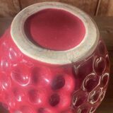Old pitcher in burgundy ceramic