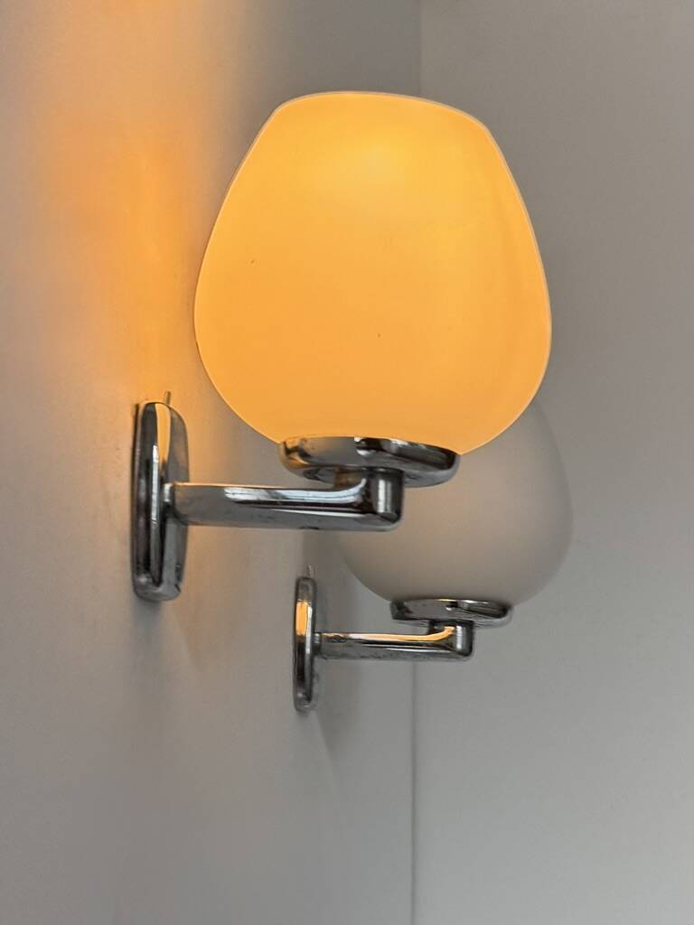 Pair of vintage opaline and chrome metal wall lights, France, 1970.