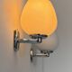 Pair of vintage opaline and chrome metal wall lights, France, 1970.