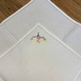 Cotton napkin edged by hand with flowers, France