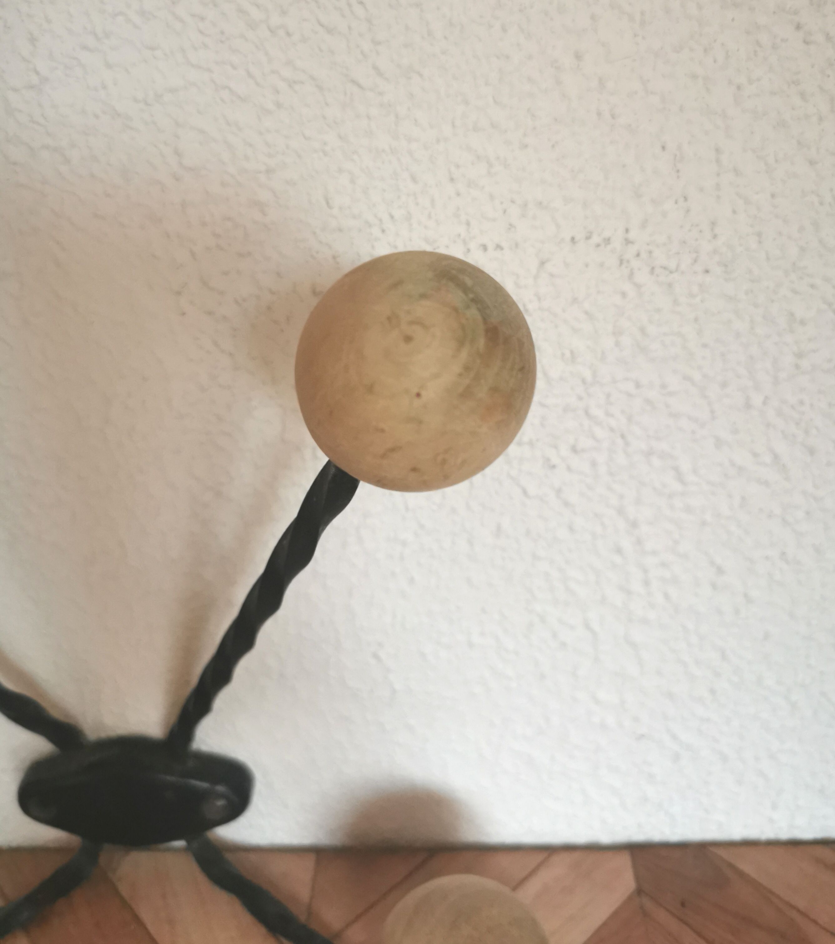 Wooden and iron wall coat holder