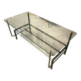 Double-tier coffee table in steel and bronze as well as glass