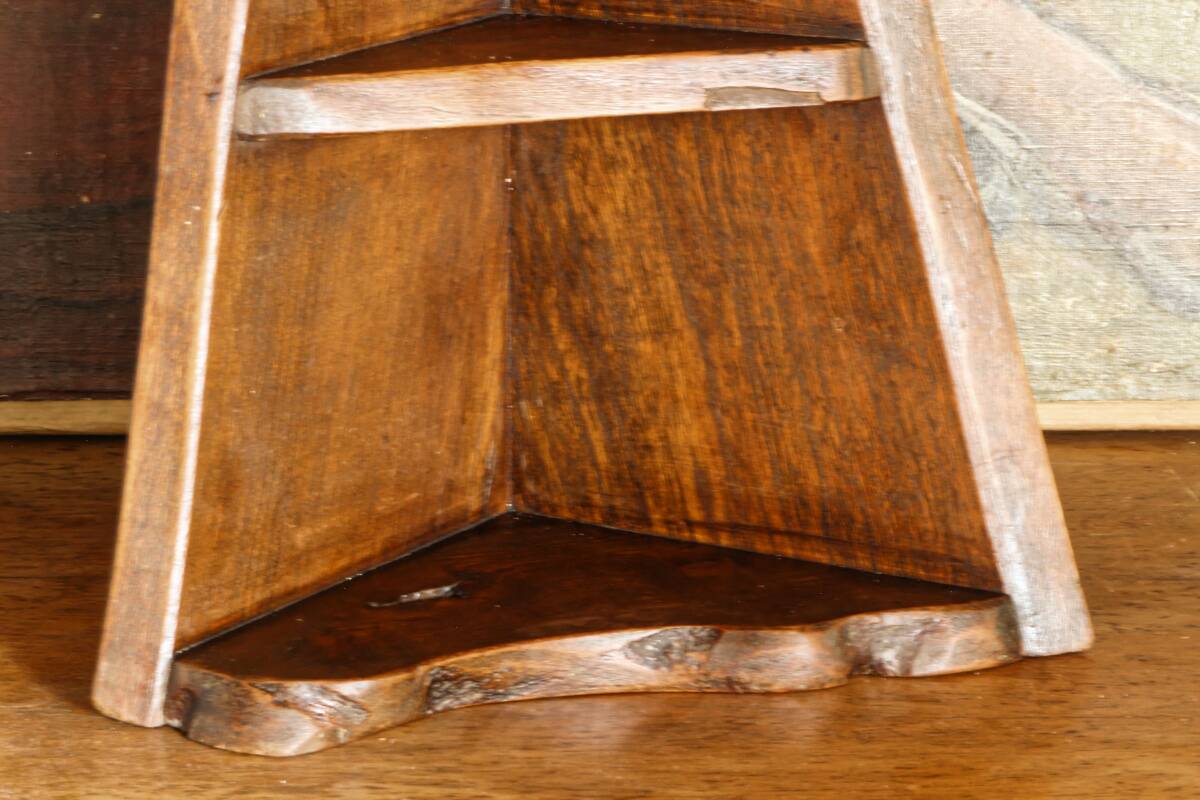 Small brutalist corner shelf in solid oak.
