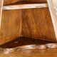 Small brutalist corner shelf in solid oak.