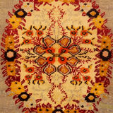 Handwoven orange wool area rug 85x155cm