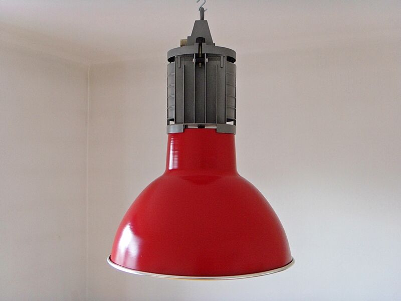 Large red aluminum lamp.