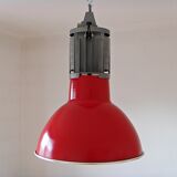 Large red aluminum lamp.