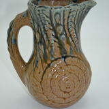 Sandstone pitcher decorated with coils