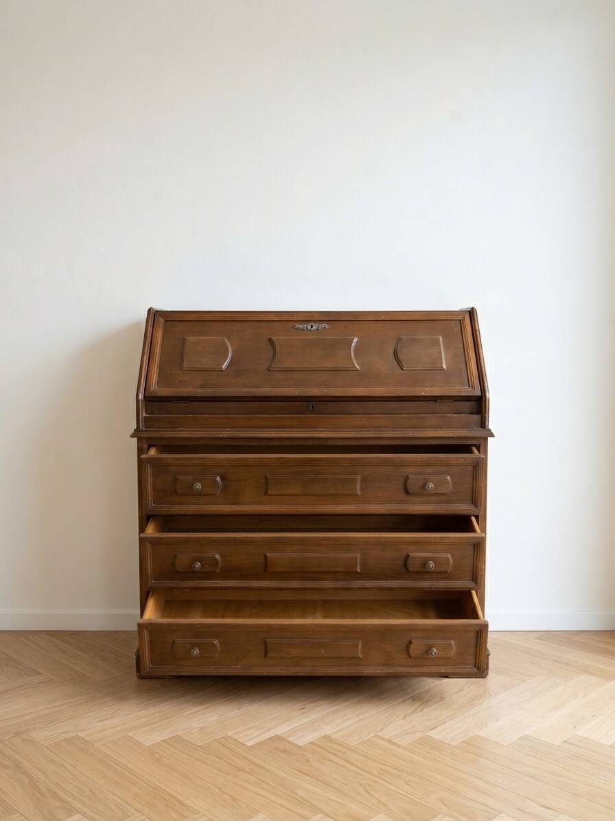 Antique wooden secretary with a drop-down front and drawers.
