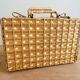 Vintage woven wicker suitcase