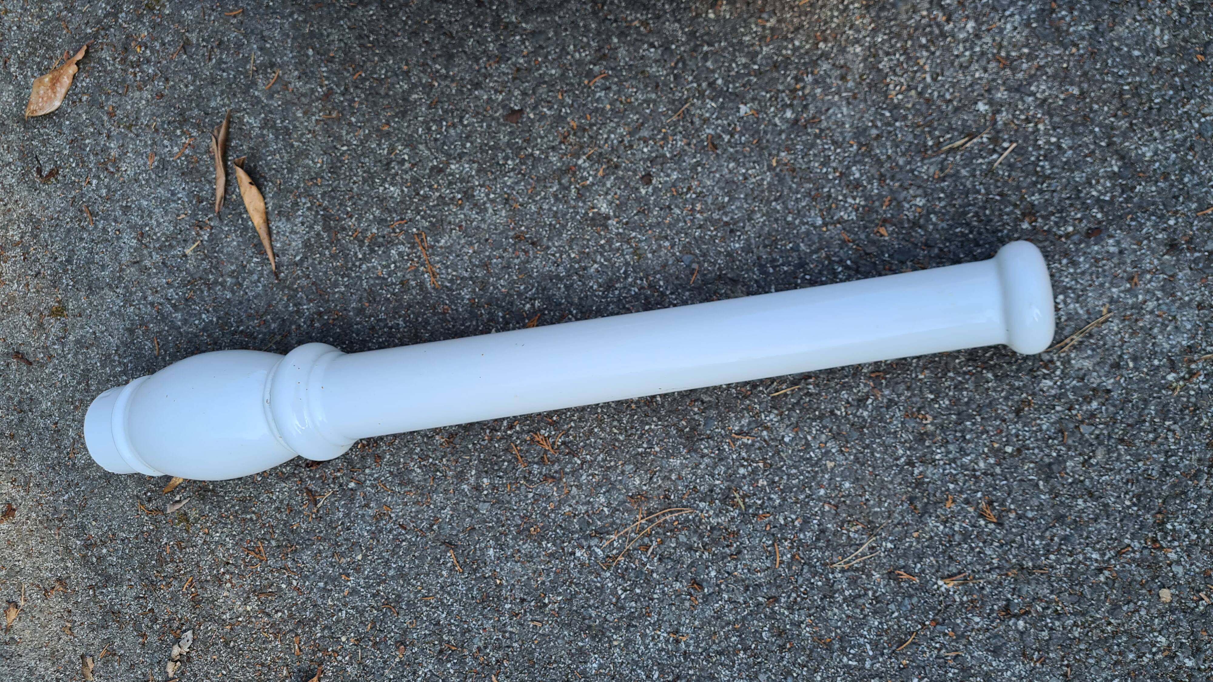 White ceramic wall washbasin with 2 ceramic legs