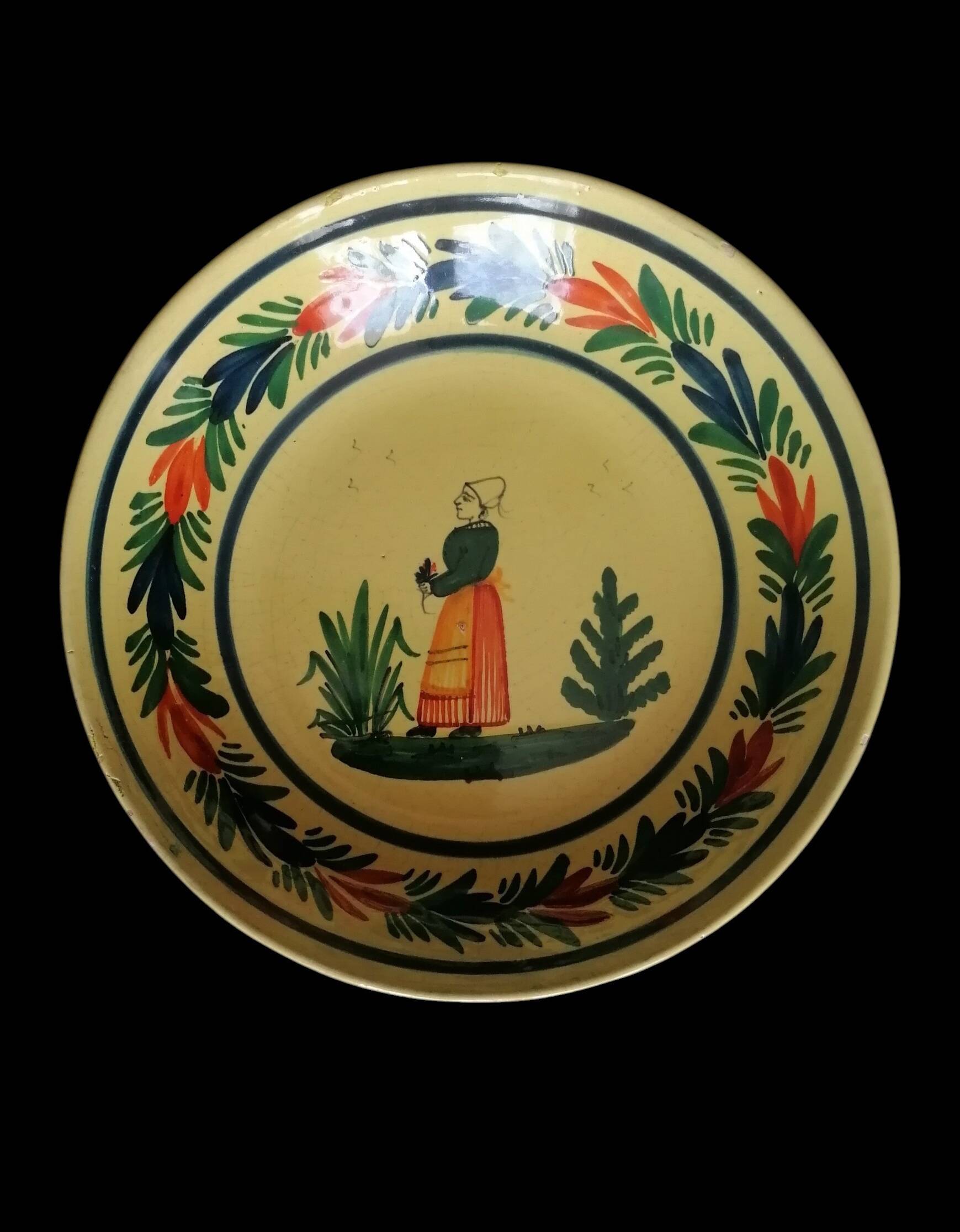 Two plates from the Breton faience HB Quimper.