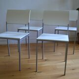 Set of 4 vintage metal and wood chairs from the 1990s.