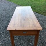Table de ferme vintage en cerisier massif à 2 tiroirs et 1 tirette à pain.