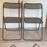 Pair of folding chairs in perforated metal