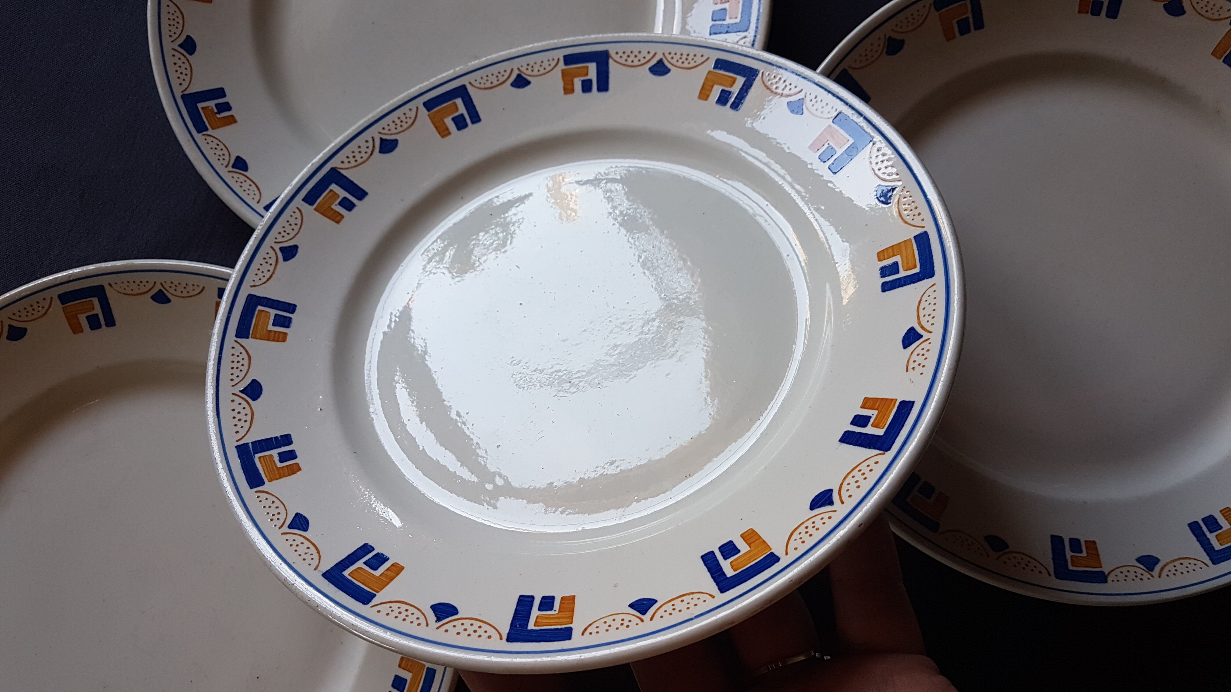 Suite of 4 plates made of Lunéville earthenware