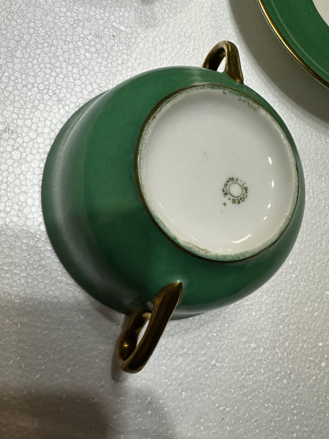Service 14 cup and saucer in Art Deco Emerald Green and Gold.