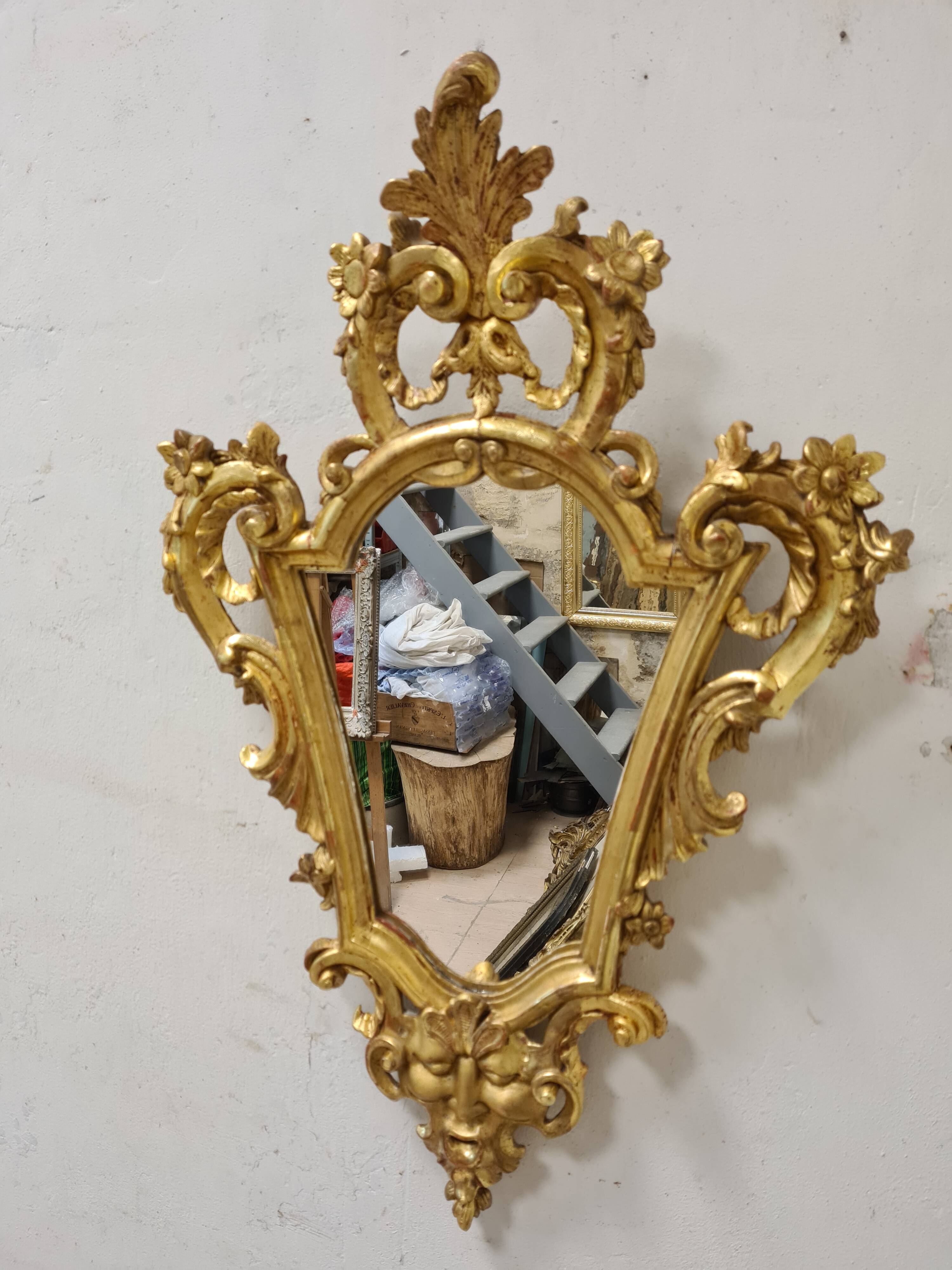 Antique baroque gilded mirror in carved wood, 18th century