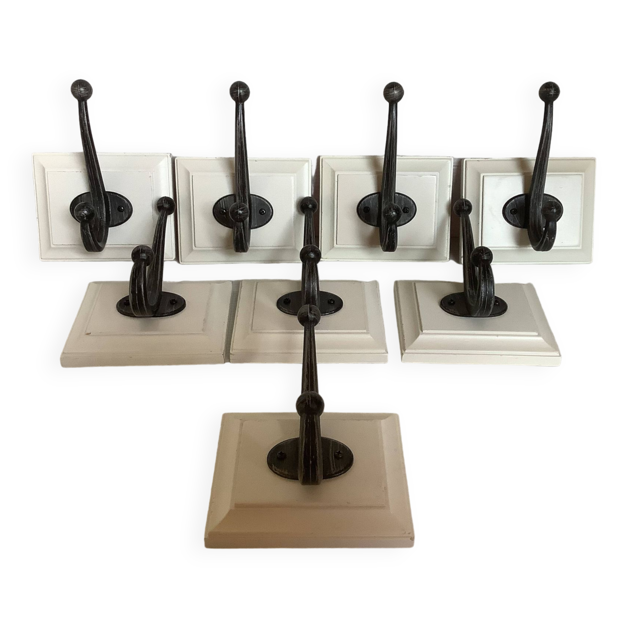 Eight double white wood metal hooks