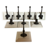 Eight double white wood metal hooks