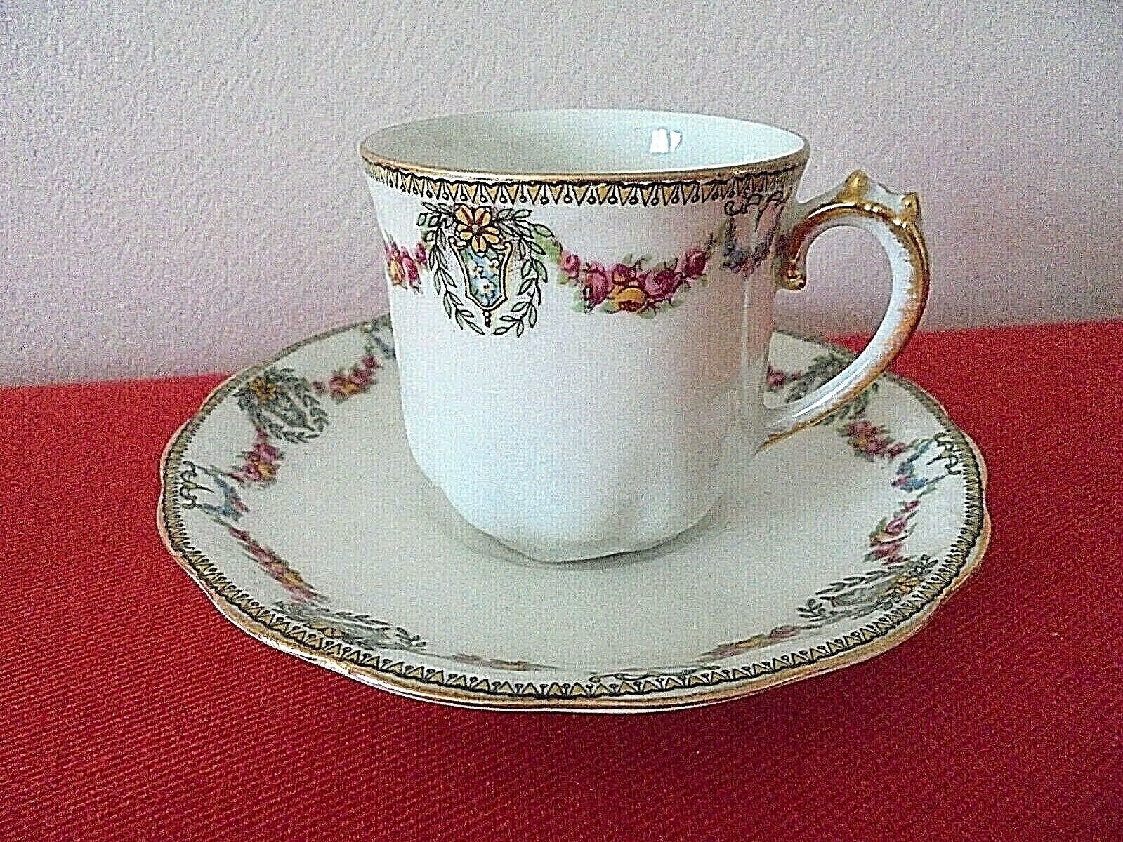 Lot 4 coffee cups and ss-cups Limoges porcelain