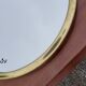 Round mirror of the 50s in gold metal 33cm in diameter