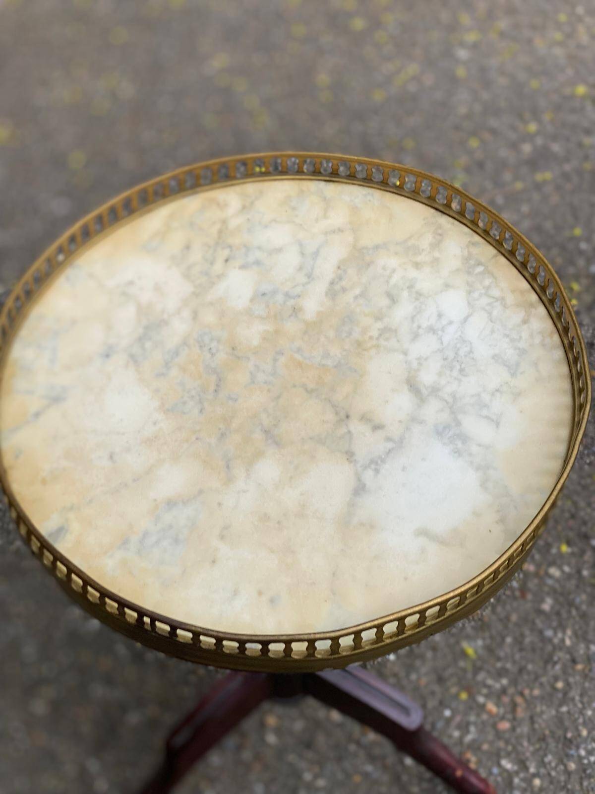 Tripod marble guéridon in gilded Louis XVI style.