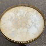 Tripod marble guéridon in gilded Louis XVI style.