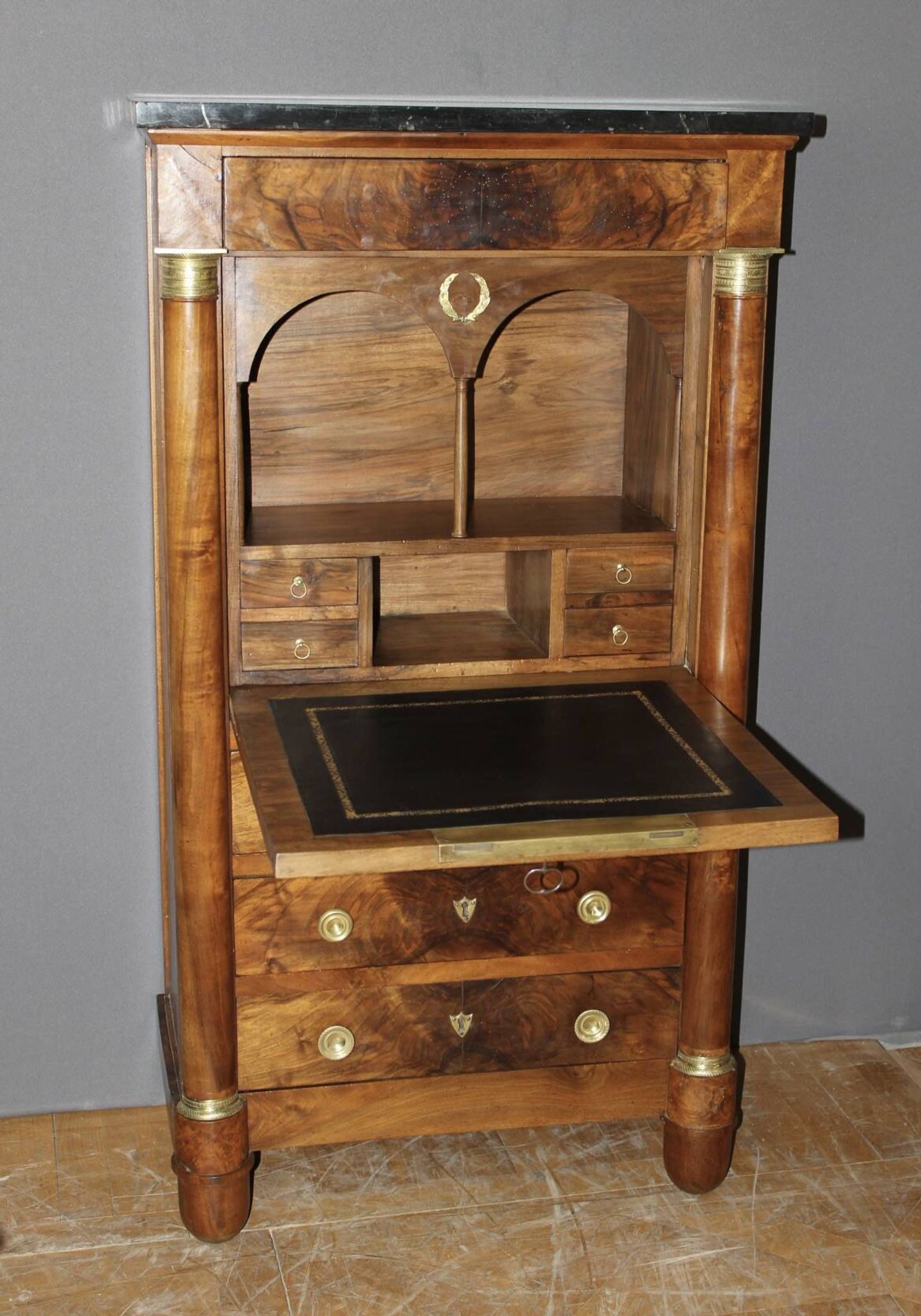 Small Empire walnut secretary from the 19th century