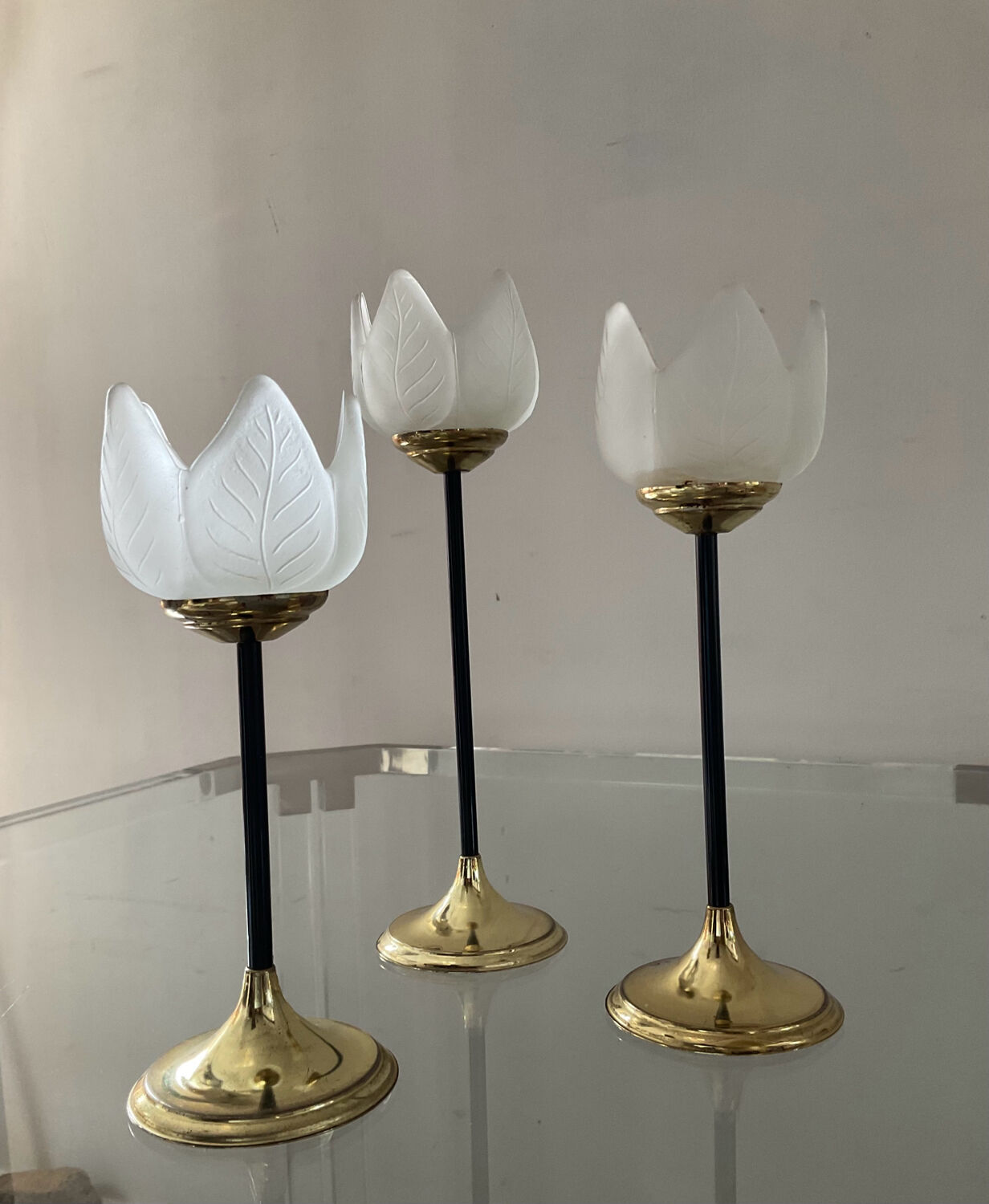 Trio of glass and metal candle holders