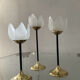 Trio of glass and metal candle holders