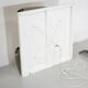 Contemporary wall light in stainless steel and metal.