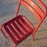 2 chairs Tolix T2 red by Xavier Pauchard