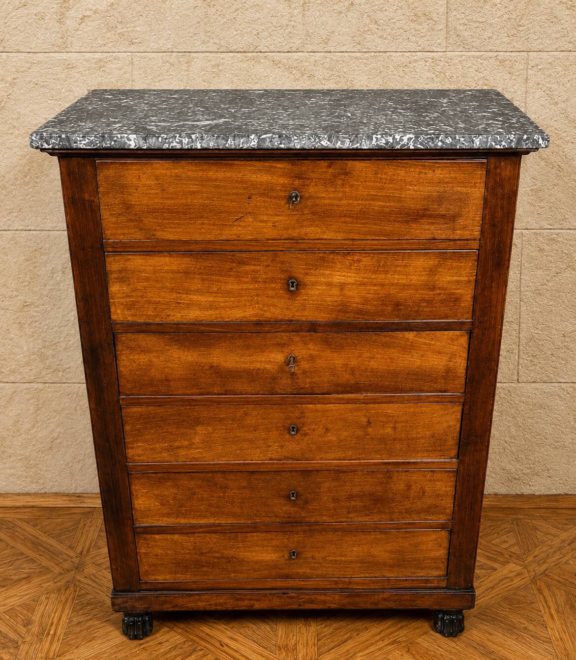 Empire Restoration period chest of drawers in mahogany, with a marble top.