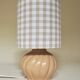 Ceramic lamp with a gingham cotton shade