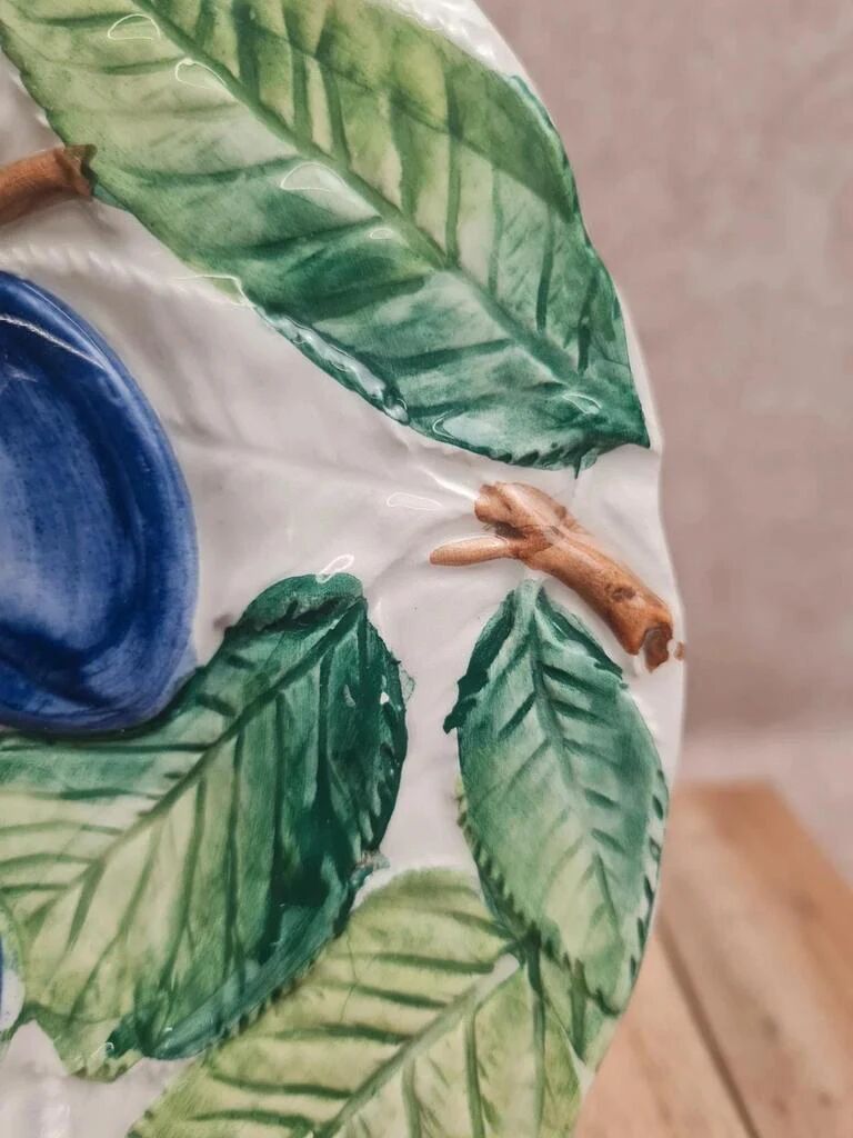 Vintage barbotine plate, plum decoration – relief foliage