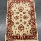 Tapis traditionnel en laine crème, petit tapis oriental à motifs floraux rouges 86 x 123 cm