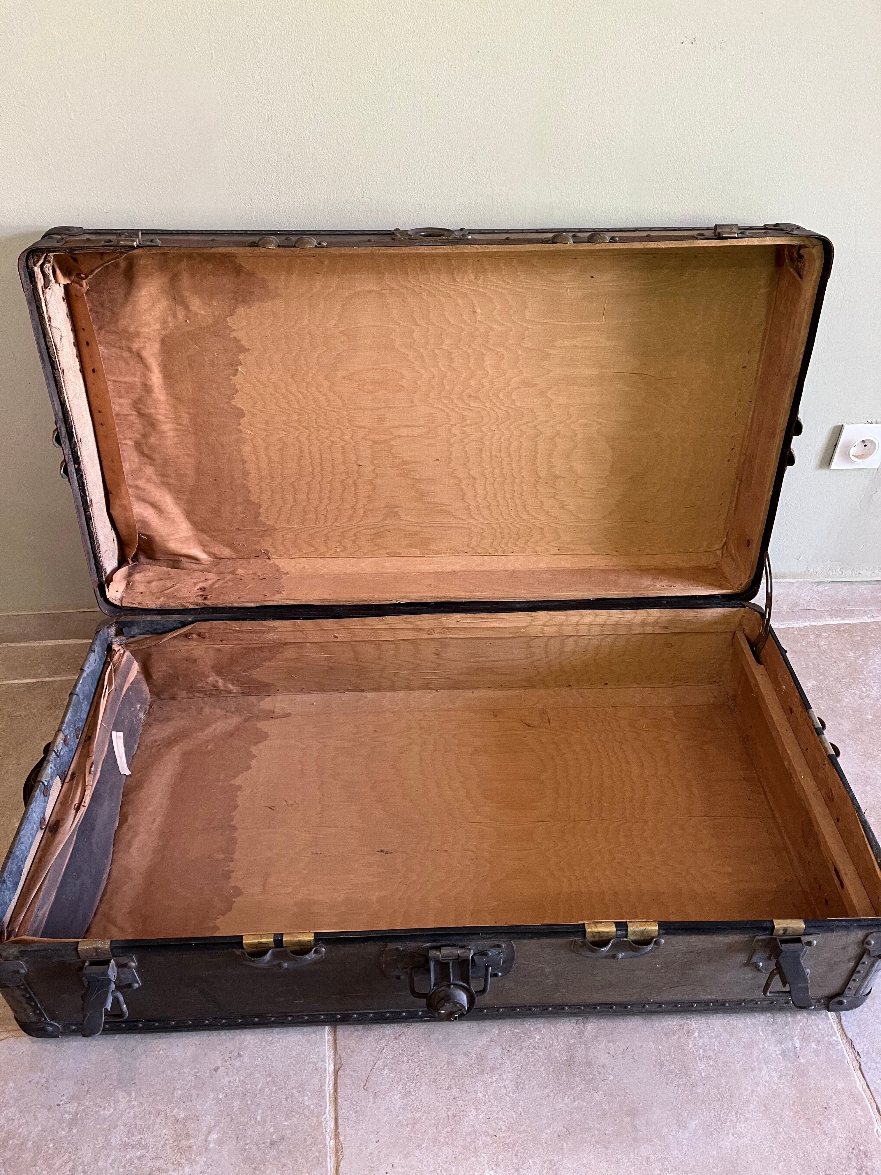 Large travel trunk from the early 20th century.