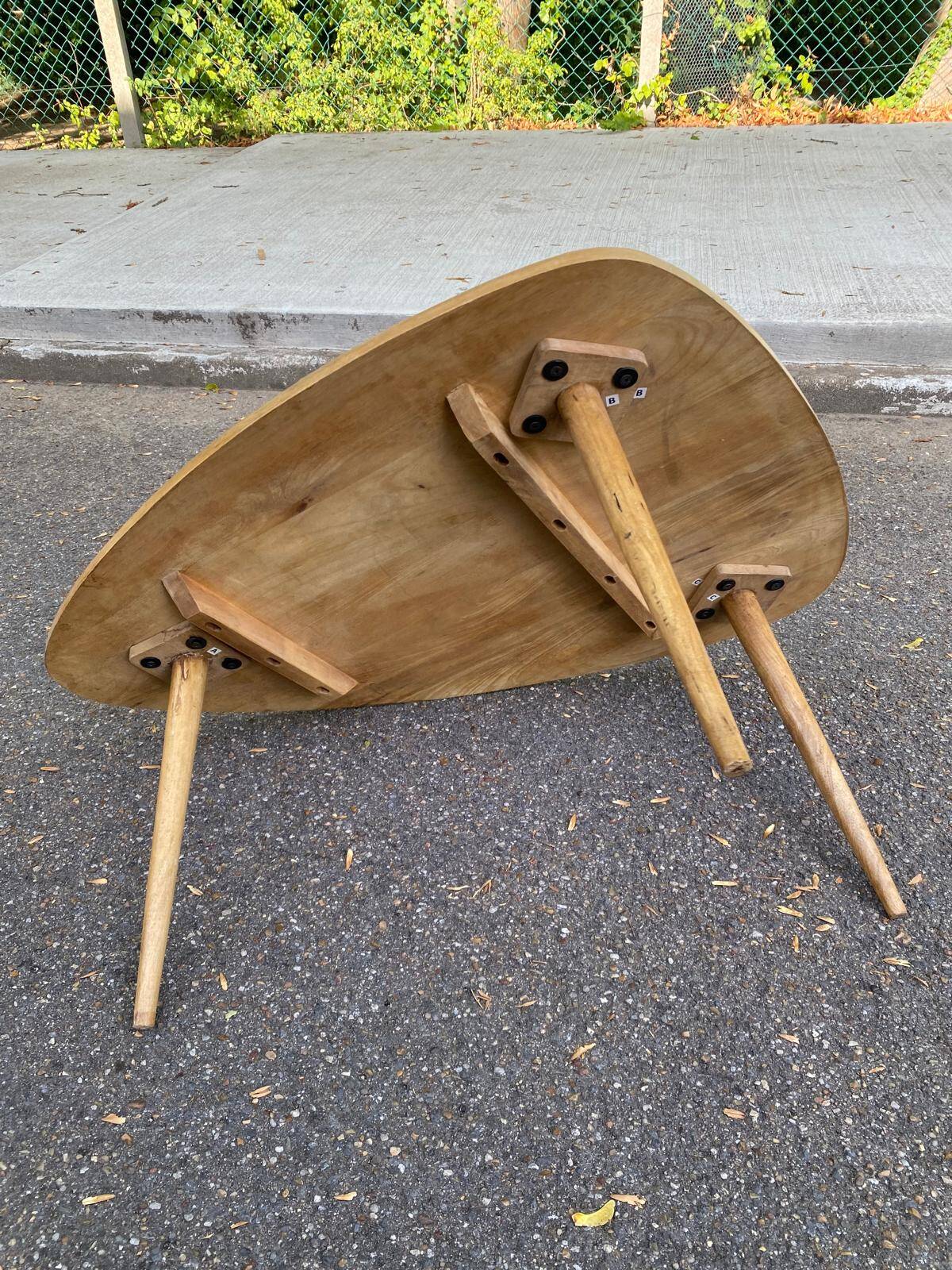 Scandinavian coffee table in the shape of a pebble/bean made of light solid wood from the years.