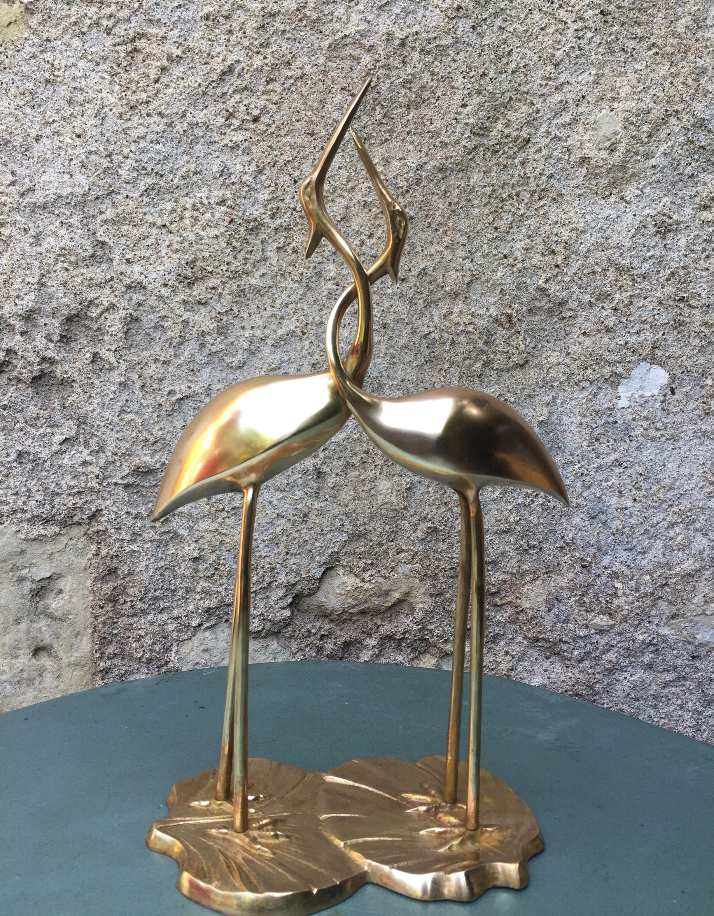 Couple of vintage brass herons
