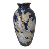 Cobalt blue porcelain vase from Limoges, France with floral pattern.